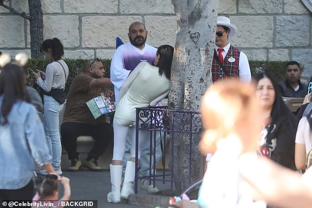 Another friend was swallowed up in an oversize purple-and-white T-shirt that he mixed with acid wash jeans and dirtied white boots