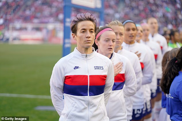 She resumed standing in later years but stayed silent and did not sing the anthem