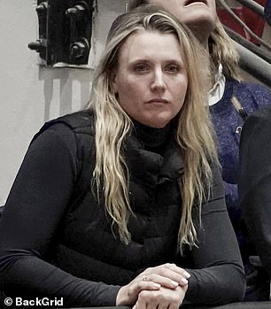 Postel looked stony faced as they sat apart in the Vegas venue