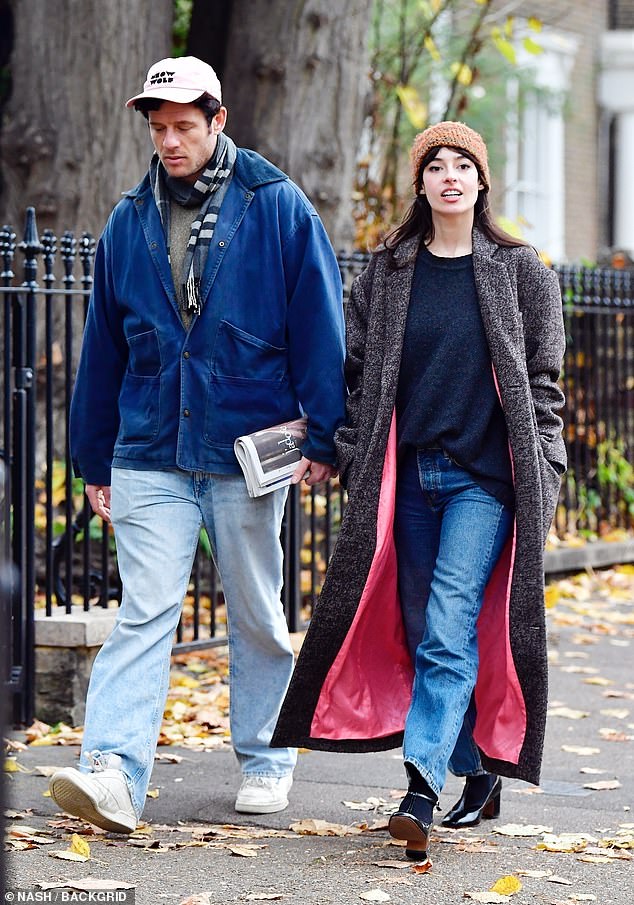 The couple continued their route as they after picking up their fashion magazine