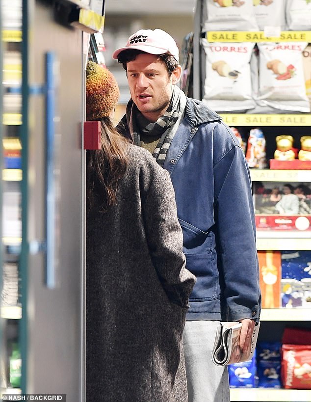 The pair appeared close in conversation as they talked inside a local shop