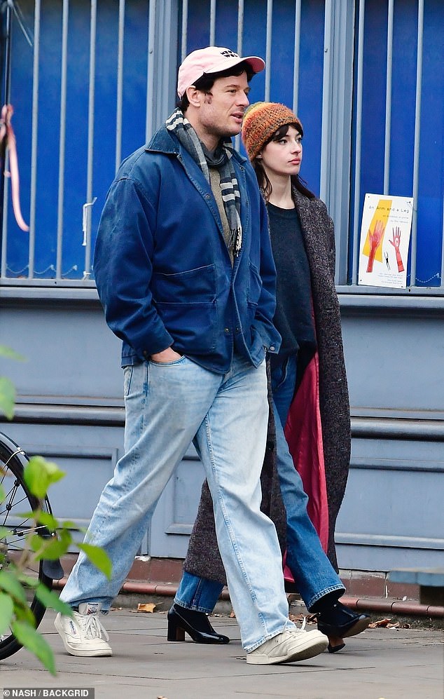 The star stepped out in double denim as he walked along the North London street