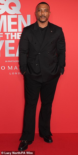 Top Boy star looked dapper in a black suit