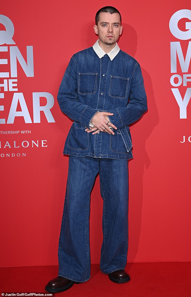 Sex Education star Asa Butterfield displayed his buzz cut on the red carpet while wearing a denim set