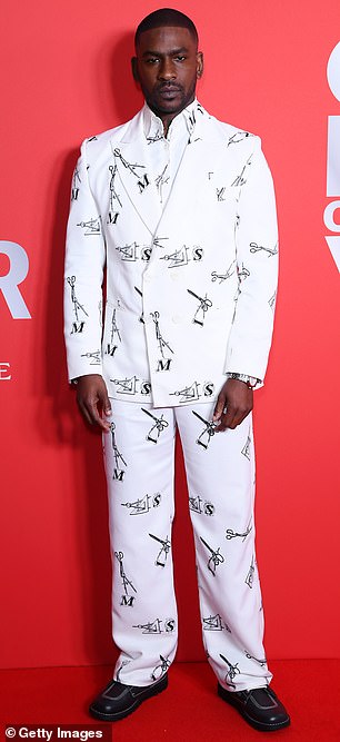 Skepta cut a vibrant display in a white graphic suit