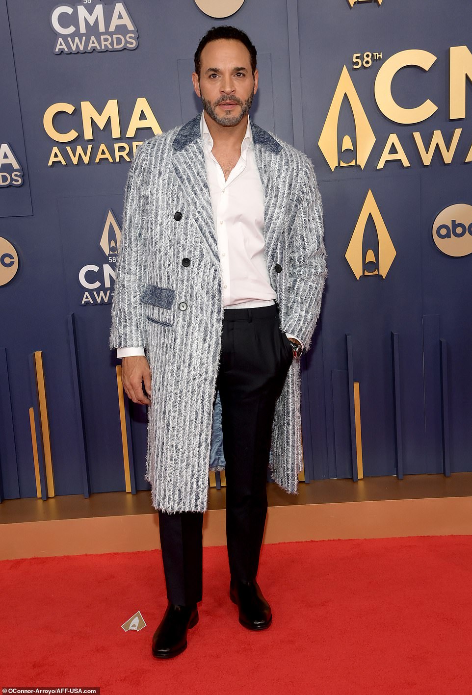 Actor Daniel Sunjata, 52, showed off his distinctive style in a fuzzy blue and white coat