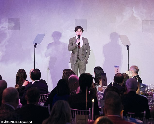 The Friday Download star - who is also a UNICEF UK High-Profile Supporter - added a white shirt underneath to complete the look