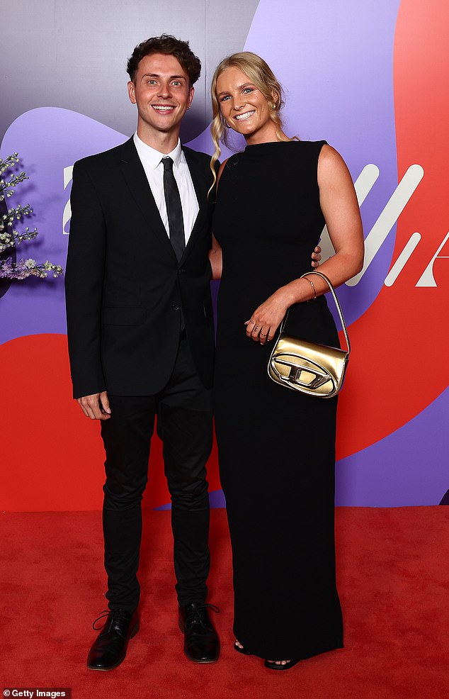 Serene Watson of the Saints went along with Kade Nanscawen, with both looking on trend in classic black, while Serene added a trendy touch with a gold Diesel bag