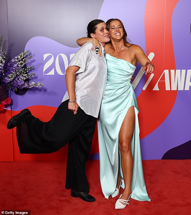 She posed up a storm alongside Nell Morris-Dalton of the Magpies, the pair larking around on the red carpet