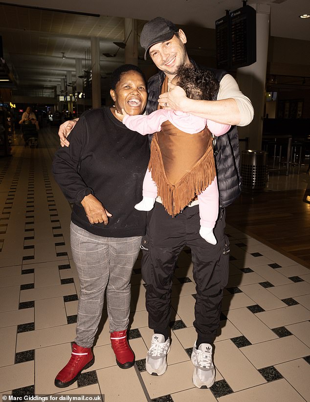 Meanwhile Oti Mabuse' husband Marius Lapure, daughter and mum all touched down in Australia on Tuesday