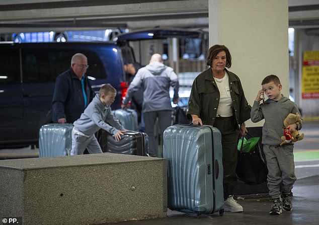 Colette and Tony McLoughlin arrived at Manchester Airport with their grandchildren Kit and Cass, at 10am to catch an Emirates flight to Brisbane