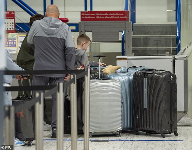 The family checked in a huge tally of suitcases ready for a couple of weeks Down Under