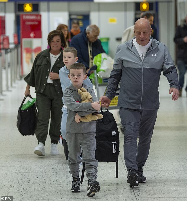 The family checked in for the 13.10 flight to Dubai which is due to connect to Brisbane in the early hours