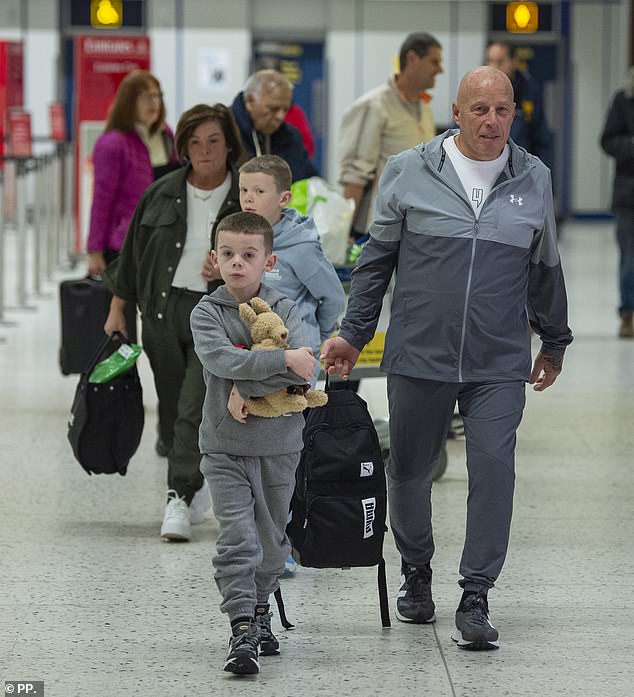 Coleen Rooney 's two youngest sons have flown out to Australia with the I'm A Celebrity star's parents, ready for an emotional reunion with their mum