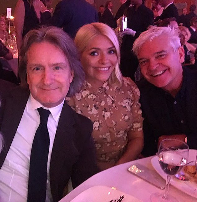 Frizell is seen here with former This Morning presenters Holly Willoughby and Phillip Schofield at the TV Choice Awards in September 2019