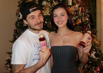 Nicola Peltz izgleda glamurozno u malenom poprsju dok mazi supruga Brooklyna Beckhama na raskošnoj večeri za Dan zahvalnosti u obiteljskoj vili u LA-u