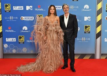 Rita Ora leads the red carpet glamour in a pink feathered gown as she joins glamorous Maya Jama, Vick Hope and Raye at the MTV EMAs in Manchester ahead of her history making THIRD appearance as host of annual ceremony