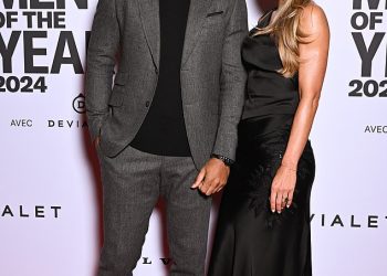 Thierry Henry izgleda uljudno uz rijetko viđenog partnera modela dok pozira na crvenom tepihu na dodjeli francuskih GQ nagrada