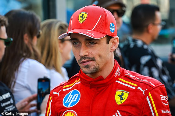 ABU DHABI, UNITED ARAB EMIRATES - DECEMBER 8: Charles Leclerc of Monaco and Ferrari walks on track during the F1 Grand Prix of Abu Dhabi at Yas Marina Circuit on December 8, 2024 in Abu Dhabi, United Arab Emirates. (Photo by Jayce Illman/Getty Images)