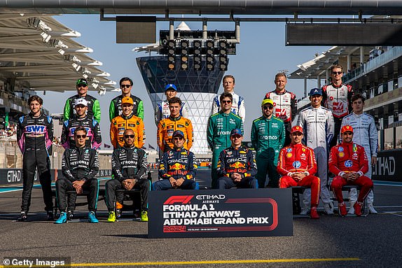 ABU DHABI, UNITED ARAB EMIRATES - DECEMBER 8: Drivers pose for the 2024 end-of-season group photo during the F1 Grand Prix of Abu Dhabi at Yas Marina Circuit on December 8, 2024 in Abu Dhabi, United Arab Emirates. (Photo by Kym Illman/Getty Images)