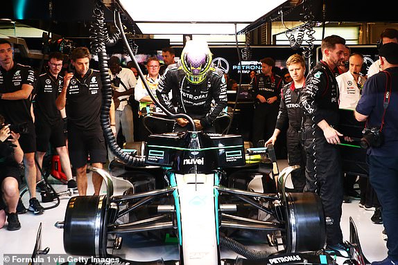ABU DHABI, UNITED ARAB EMIRATES - DECEMBER 08: Lewis Hamilton of Great Britain and Mercedes prepares to drive his final race for Mercedes in the garage prior to the F1 Grand Prix of Abu Dhabi at Yas Marina Circuit on December 08, 2024 in Abu Dhabi, United Arab Emirates. (Photo by Peter Fox - Formula 1/Formula 1 via Getty Images)