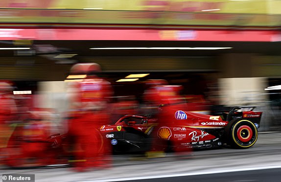 Formula One F1 - Abu Dhabi Grand Prix - Yas Marina Circuit, Abu Dhabi, United Arab Emirates - December 8, 2024 Ferrari's Carlos Sainz Jr. during a pit stop REUTERS/Hamad I Mohammed/Pool