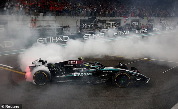Formula One F1 - Abu Dhabi Grand Prix - Yas Marina Circuit, Abu Dhabi, United Arab Emirates - December 8, 2024 Mercedes' Lewis Hamilton in his car after finishing fourth in his last race for Mercedes REUTERS/Jakub Porzycki
