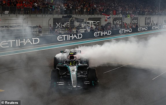 Formula One F1 - Abu Dhabi Grand Prix - Yas Marina Circuit, Abu Dhabi, United Arab Emirates - December 8, 2024 Mercedes' Lewis Hamilton in his car after finishing fourth in his last race for Mercedes REUTERS/Jakub Porzycki