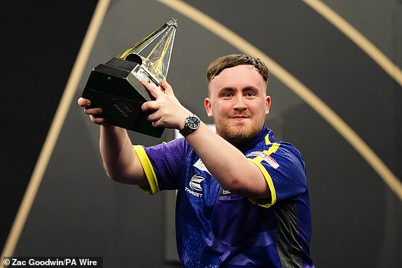 File photo dated 23-05-2024 of Luke Littler celebrates with the trophy after victory in the final against Luke Humphries during the 2024 BetMGM Premier League play-off at The O2, London. The six-strong shortlist for the 2024 BBC Sports Personality of the Year award was announced on Monday morning. Issue date: Monday December 9, 2024. PA Photo. See PA story SPORT Personality. Photo credit should read: Zac Goodwin/PA Wire