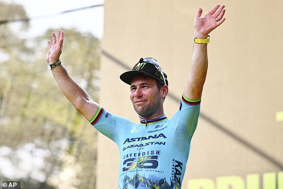 Mark Cavendish of Astana Qazaqstan poses on the podium during the Prudential Singapore Tour De France Criterium, Sunday, November 10th, 2024. (AP Photo/Danial Hakim)