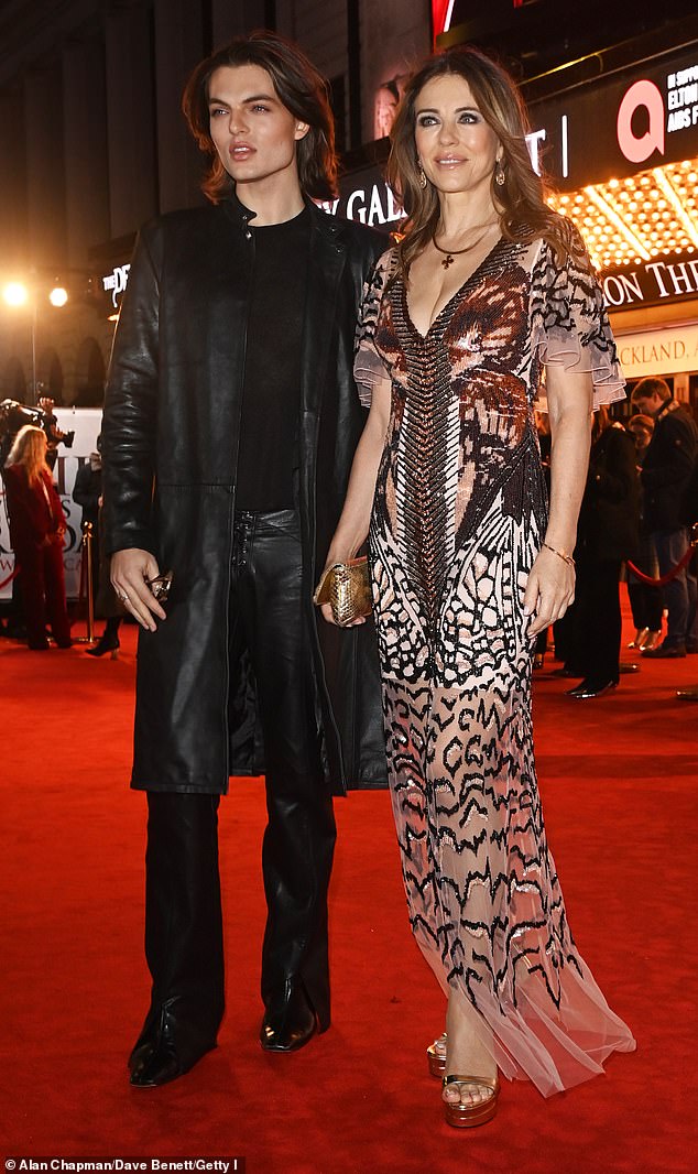 She opted for chic jewellery as well as gold accessories as she slipped her feet into a pair of towering platform heels while toting her essentials for the evening in a metallic clutch