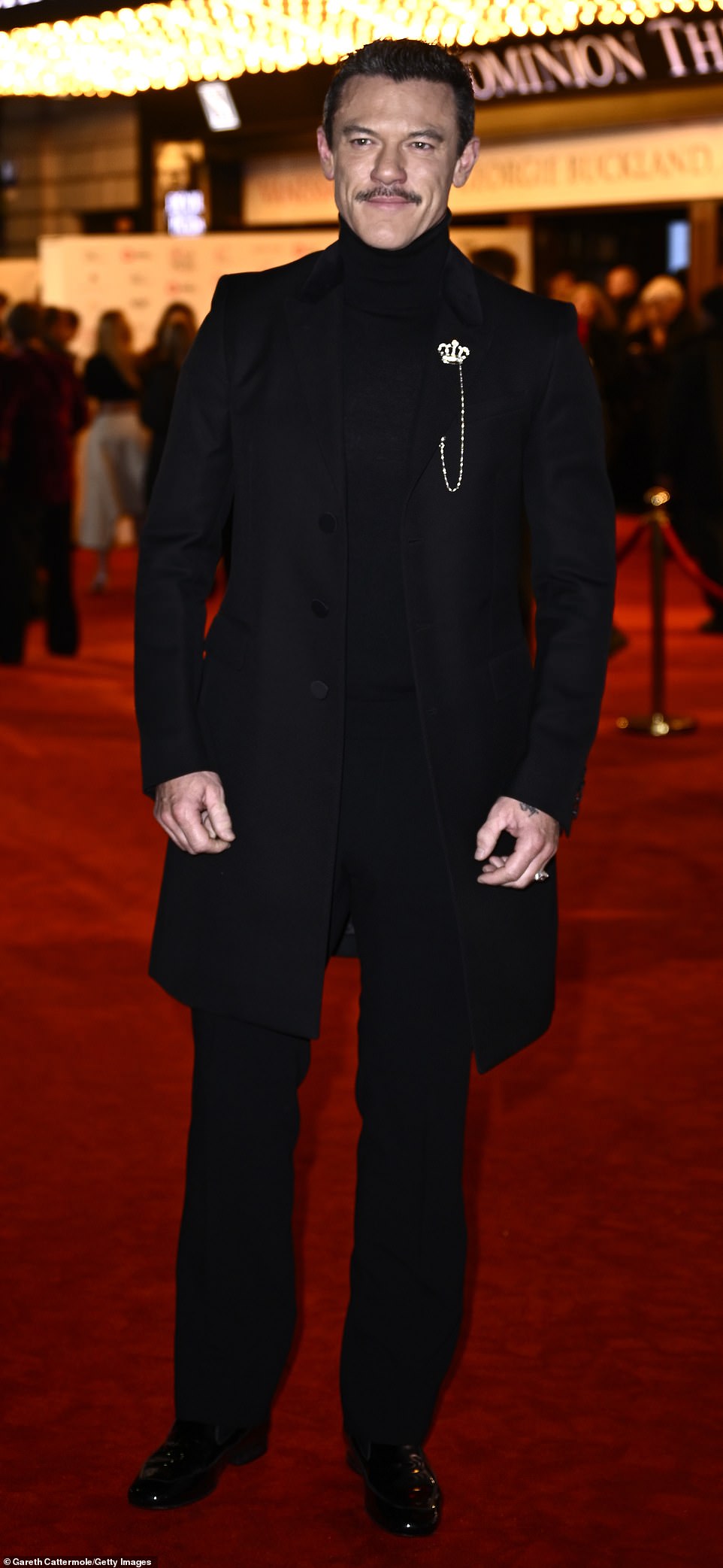 The Welsh actor looked dashing in a black wool coat which she accessorised with a bejewelled broach