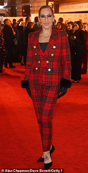 and Michelle Visage were both suited and booted for the glitzy premiere