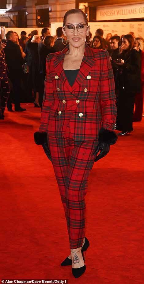 and Michelle Visage were both suited and booted for the glitzy premiere