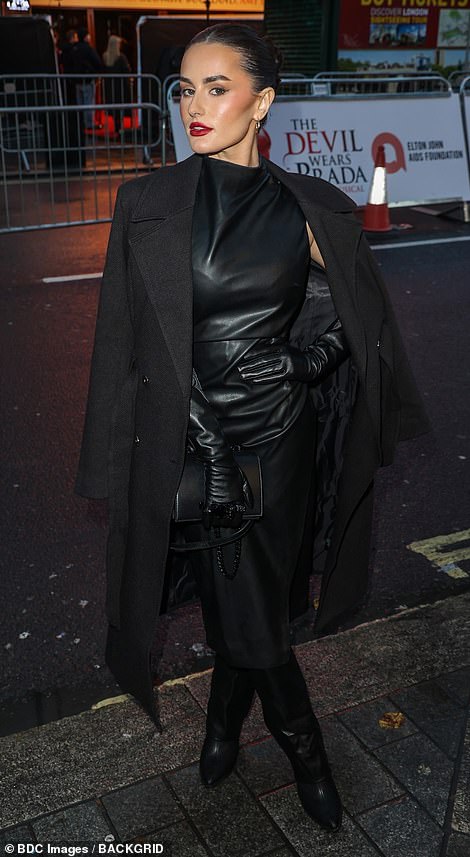 Love Island and West End star Amber Davies, 28, set pulses racing in a raunchy black leather dress and knee-high boots