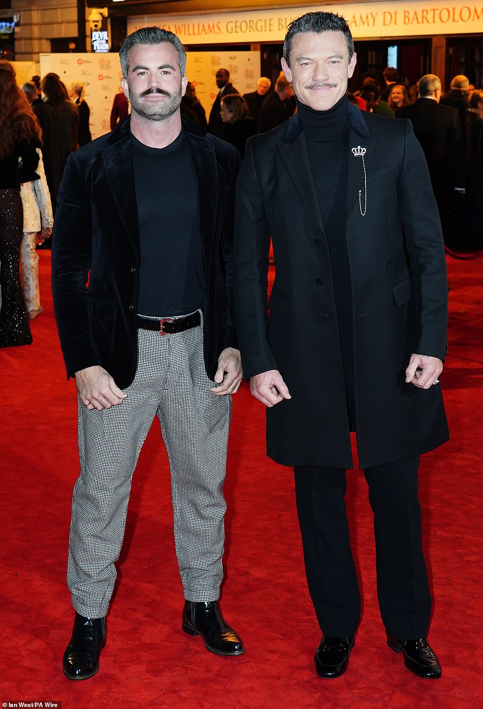 Luke (L) was joined by hunky boyfriend Fran Tomas (R)