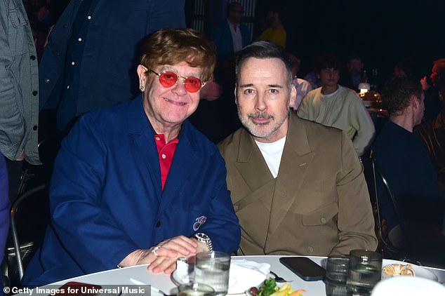 Sir Elton John left husband David Furnish emotional in his new documentary after saying he would 'not be around' to see their young sons get married (pictured 2023)