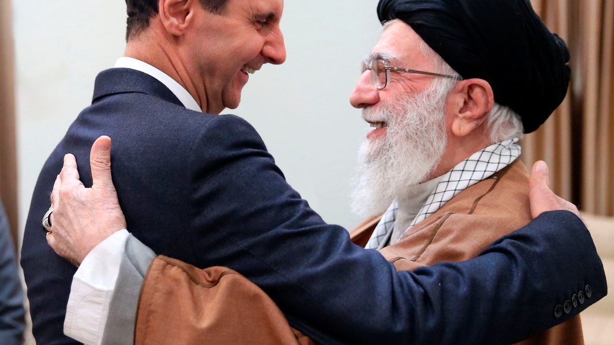 Sirijski predsjednik Bashar Assad, lijevo, i iranski vrhovni vođa ajatolah Ali Khamenei