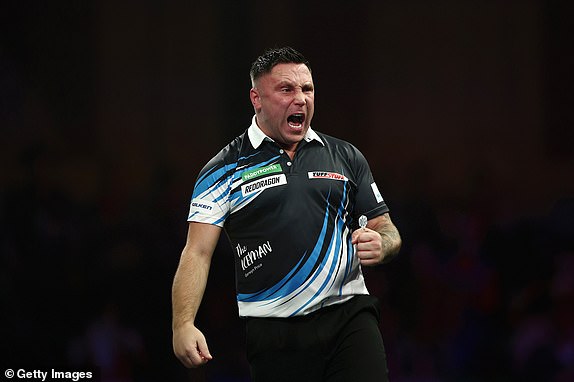 LONDON, ENGLAND - DECEMBER 29: Gerwyn Price of Wales reacts against Jonny Clayton of Wales during their fourth round match on day twelve of the 2024/25 Paddy Power World Darts Championship at Alexandra Palace on December 29, 2024 in London, England.  (Photo by James Fearn/Getty Images)