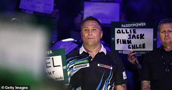 LONDON, ENGLAND - DECEMBER 29: Gerwyn Price of Wales looks on as he enters the arena prior to his fourth round match against Jonny Clayton of Wales on day twelve of the 2024/25 Paddy Power World Darts Championship at Alexandra Palace on December 29, 2024 in London, England.  (Photo by James Fearn/Getty Images)