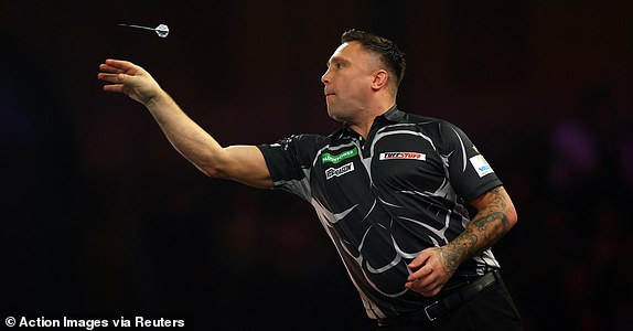 Darts - 2025 PDC World Darts Championship - Alexandra Palace, London, Britain - January 1, 2025 Gerwyn Price in action during his quarter final match against Chris Dobey Action Images via Reuters/Andrew Boyers