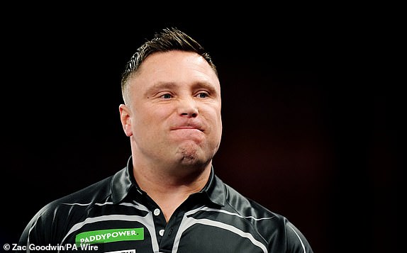 Gerwyn Price reacts during their quarter final match against Chris Dobey (not pictured) on day fourteen of the Paddy Power World Darts Championship at Alexandra Palace, London. Picture date: Wednesday January 1, 2025. PA Photo. See PA story DARTS World. Photo credit should read: Zac Goodwin/PA Wire.RESTRICTIONS: Use subject to restrictions. Editorial use only, no commercial use without prior consent from rights holder.