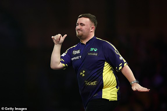 LONDON, ENGLAND - DECEMBER 30: Luke Littler of England reacts against Ryan Joyce of England during their fourth round match on day thirteen of the 2024/25 Paddy Power World Darts Championship at Alexandra Palace on December 30, 2024 in London, England.  (Photo by James Fearn/Getty Images)