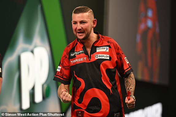 Mandatory Credit: Photo by Simon West/Action Plus/Shutterstock (15047245cy) Nathan Aspinall reacts on winning his fourth round match with Ricardo Pietreczko; 30th December 2024, Alexandra Palace, London, England; 2024/25 PDC Paddy Power World Darts Championships Day 13. PDC World Darts Championship, Day 13, London, UK - 30 Dec 2024