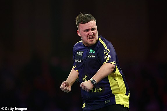 LONDON, ENGLAND - DECEMBER 30: Luke Littler of England celebrates victory over Ryan Joyce of England following their fourth round match on day thirteen of the 2024/25 Paddy Power World Darts Championship at Alexandra Palace on December 30, 2024 in London, England.  (Photo by James Fearn/Getty Images)
