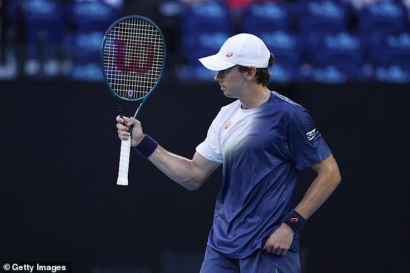 MELBOURNE, AUSTRALIA - JANUARY 14: Alex de Minaur of Australia celebrates a point against Botic van de Zandschulp of the Netherlands in the Men's Singles First Round match during day three of the 2025 Australian Open at Melbourne Park on January 14, 2025 in Melbourne, Australia. (Photo by Daniel Pockett/Getty Images)