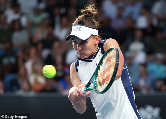 MELBOURNE, AUSTRALIA - JANUARY 16: Veronika Kudermetova plays a backhand against Katie Boulter of Great Britain in the Women's Singles Second Round match during day five of the 2025 Australian Open at Melbourne Park on January 16, 2025 in Melbourne, Australia. (Photo by Kelly Defina/Getty Images)