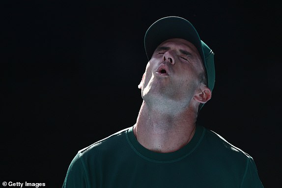 MELBOURNE, AUSTRALIA - JANUARY 21: Tommy Paul of the United States reacts in the Men's Singles Quarterfinal  against Alexander Zverev of Germany during day 10 of the 2025 Australian Open at Melbourne Park on January 21, 2025 in Melbourne, Australia. (Photo by Quinn Rooney/Getty Images)