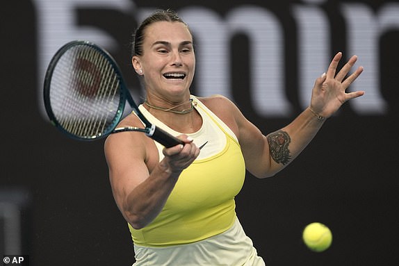 Aryna Sabalenka of Belarus plays a forehand return to Anastasia Pavlyuchenkova of Russia during their quarterfinal match at the Australian Open tennis championship in Melbourne, Australia, Tuesday, Jan. 21, 2025. (AP Photo/Ng Han Guan)