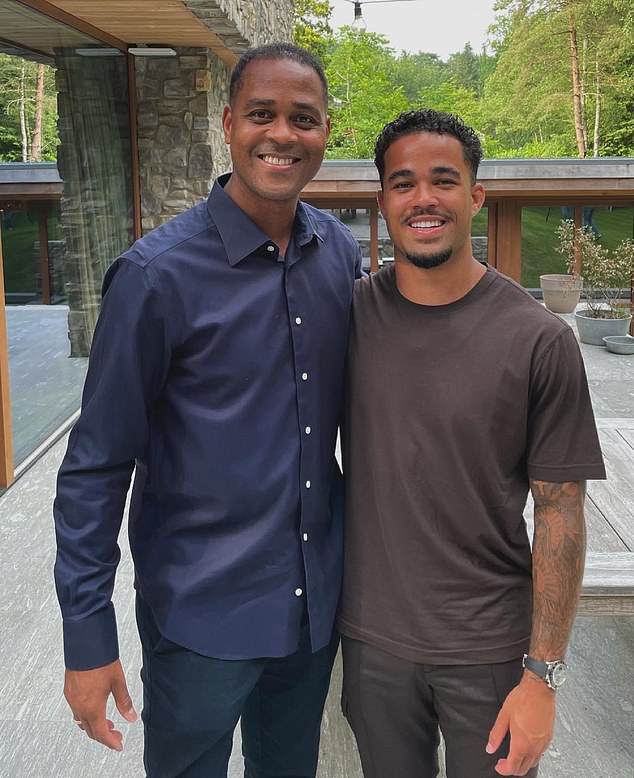 Patrick (left) with Justin, one of his five sons - four of whom play football